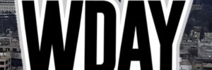 Logo of WDAY News/Talk radio station with 93.1FM and AM970 frequencies, against a cityscape background.