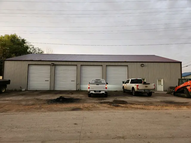 A metal shop building with overhead doors, a commercial building inspected by Nordic Inspections in Casselton, ND.