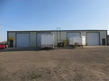 A metal shop building with overhead doors, a commercial building inspected by Nordic Inspections in Dilworth, MN.