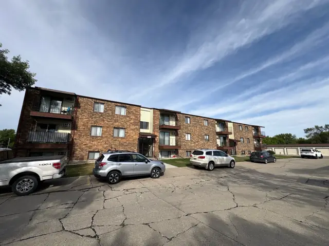 A walk-up apartment building with a shared entrance, a commercial building inspected by Nordic Inspections in Fargo, ND.