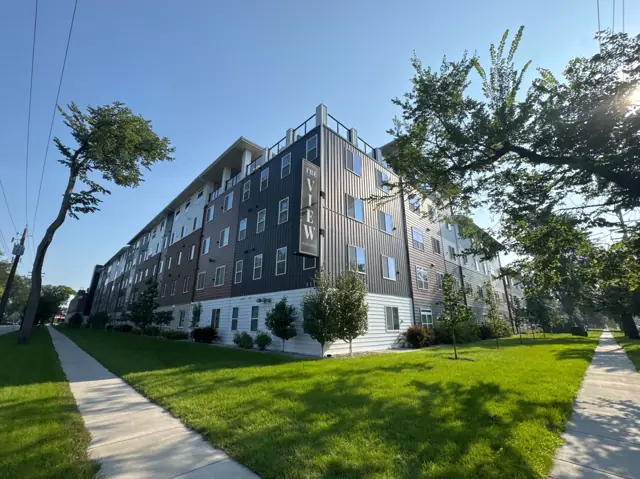 A walk-up apartment building with a shared entrance — commercial building inspected by Nordic Inspections in Fargo, ND.