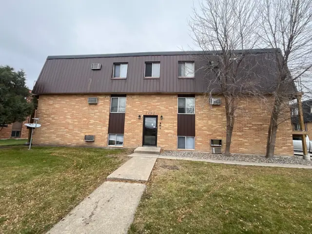 A multi-story brick apartment building, a commercial building inspected by Nordic Inspections in Fargo, ND.