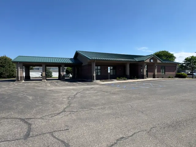 A bank building with a drive-thru canopy — commercial building inspected by Nordic Inspections in Fargo, ND.