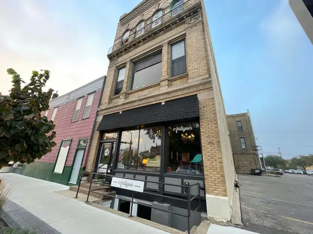 A multi-story historic building with street-level storefronts, a commercial building inspected by Nordic Inspections in Fargo, ND.