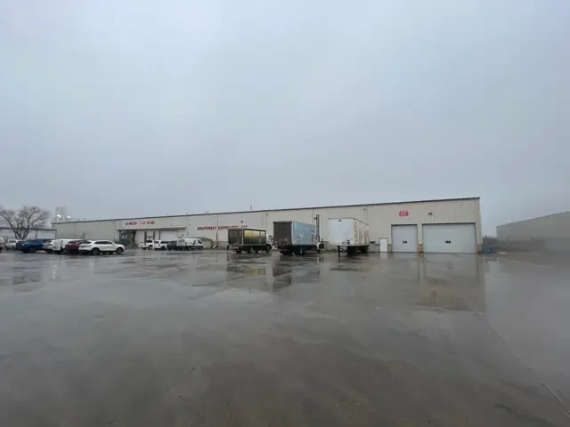 An industrial facility with a wide paved yard — commercial building inspected by Nordic Inspections in Fargo, ND.