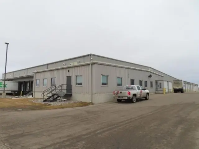 An industrial facility with a wide paved yard — commercial building inspected by Nordic Inspections in Fargo, ND.