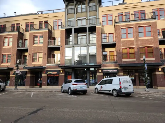 A mixed-use building with storefronts and upper floors, a commercial building inspected by Nordic Inspections in Fargo, ND.