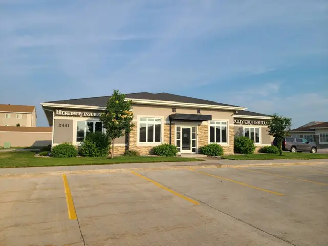 A single-story office building with a front parking lot, a commercial building inspected by Nordic Inspections in Fargo, ND.