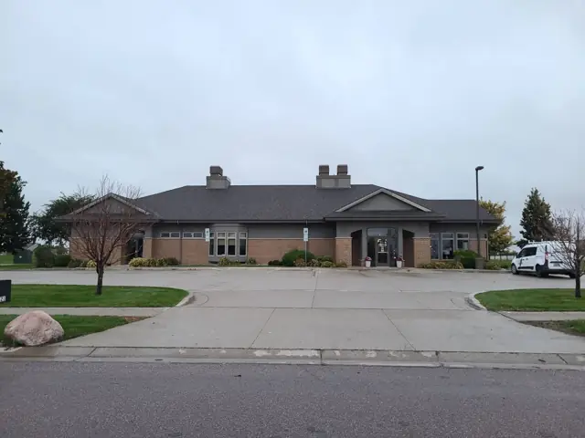 A single-story office building with a front parking lot — commercial building inspected by Nordic Inspections in Fargo, ND.