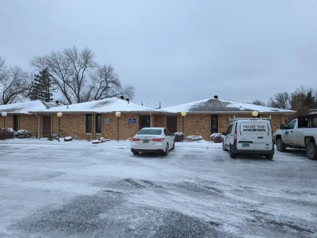 A single-story office building with a front parking lot, a commercial building inspected by Nordic Inspections in Fargo, ND.