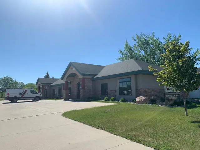 A single-story office building with a front parking lot — commercial building inspected by Nordic Inspections in Fargo, ND.