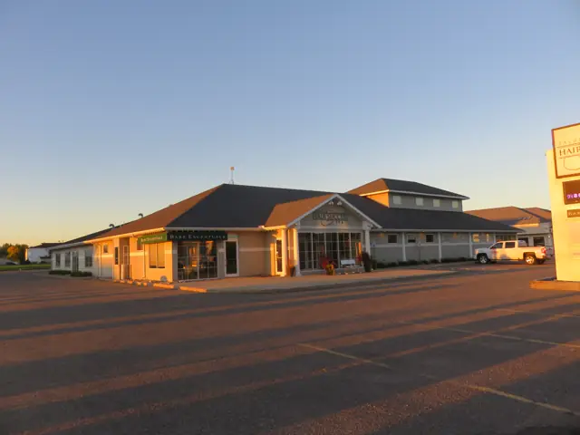 An office building with a landscaped entrance — commercial building inspected by Nordic Inspections in Fargo, ND.