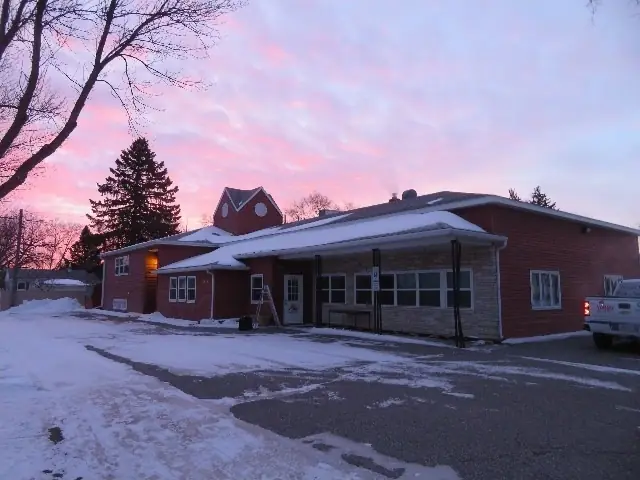 A single-story office building with a front parking lot, a commercial building inspected by Nordic Inspections in Fargo, ND.