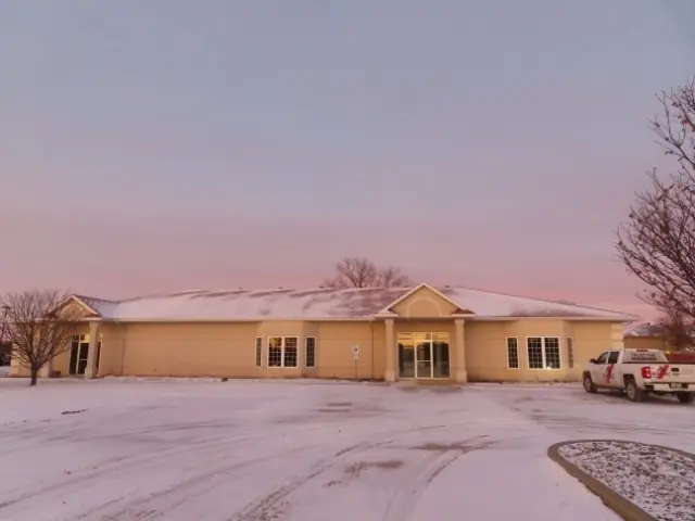 An office building with a landscaped entrance, a commercial building inspected by Nordic Inspections in Fargo, ND.