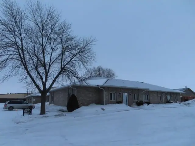 A single-story office building with a front parking lot, a commercial building inspected by Nordic Inspections in Fargo, ND.