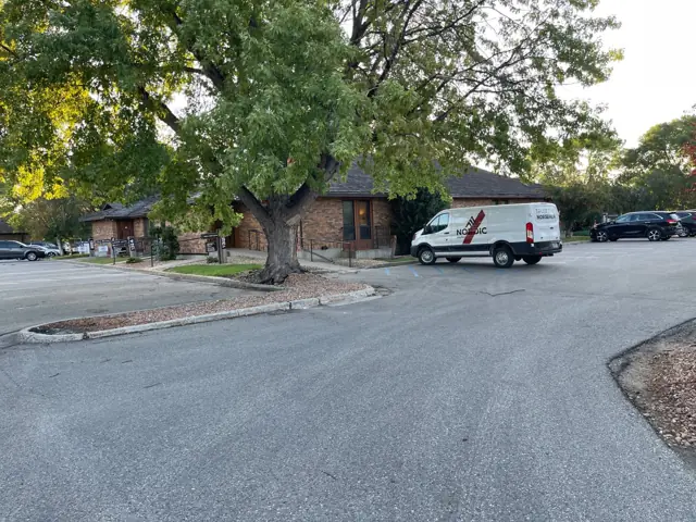 A single-story office building with a front parking lot, a commercial building inspected by Nordic Inspections in Fargo, ND.