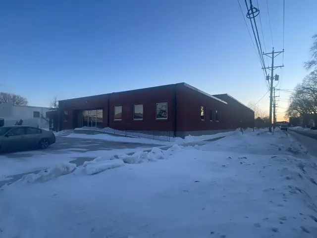 A single-story office building with a front parking lot, a commercial building inspected by Nordic Inspections in Fargo, ND.