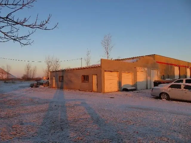 An office/warehouse building with overhead doors, a commercial building inspected by Nordic Inspections in Fargo, ND.