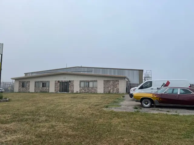 An office/warehouse building with overhead doors, a commercial building inspected by Nordic Inspections in Fargo, ND.