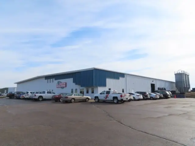 An office/warehouse with a paved lot, a commercial building inspected by Nordic Inspections in Fargo, ND.