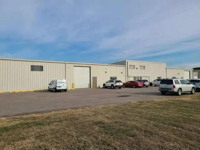 An office/warehouse building with overhead doors, a commercial building inspected by Nordic Inspections in Fargo, ND.