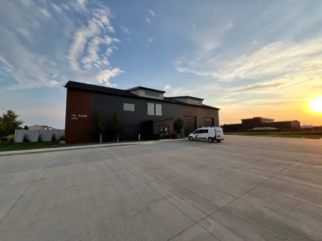 An office/warehouse building with overhead doors — commercial building inspected by Nordic Inspections in Fargo, ND.