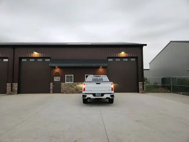 A shop building with a paved apron, a commercial building inspected by Nordic Inspections in Fargo, ND.