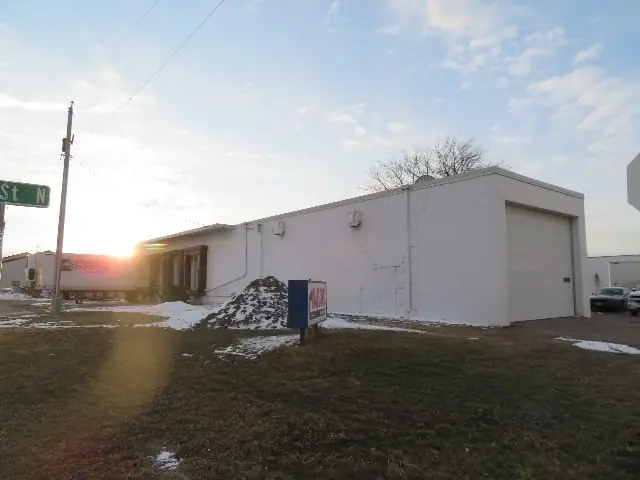 A metal shop building with overhead doors, a commercial building inspected by Nordic Inspections in Fargo, ND.