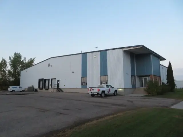 A metal shop building with overhead doors — commercial building inspected by Nordic Inspections in Fargo, ND.