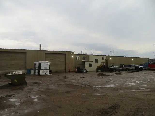 A metal shop building with overhead doors, a commercial building inspected by Nordic Inspections in Fargo, ND.