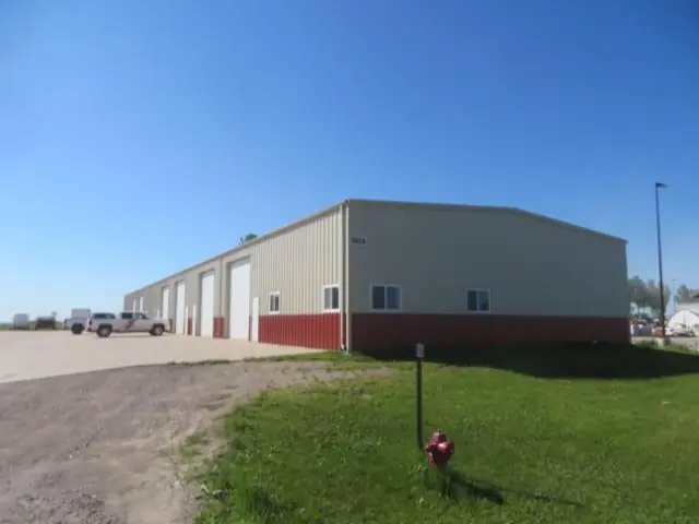 A warehouse with loading doors, a commercial building inspected by Nordic Inspections in Fargo, ND.