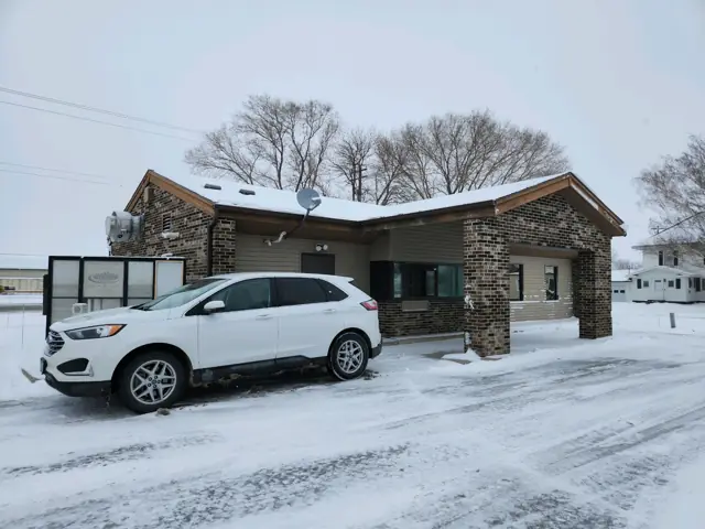 A bank building with a drive-thru canopy — commercial building inspected by Nordic Inspections in Glyndon, MN.