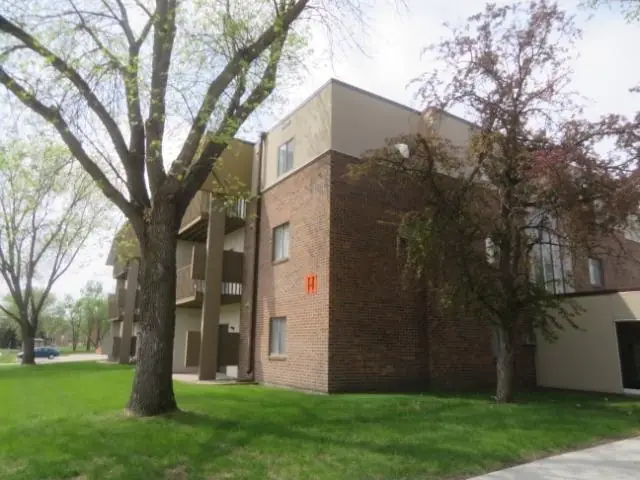 A walk-up apartment building with a shared entrance, a commercial building inspected by Nordic Inspections in Grand Forks, ND.