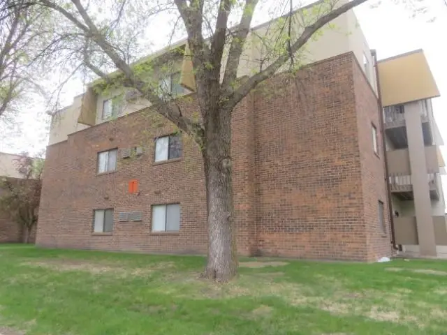 A walk-up apartment building with a shared entrance, a commercial building inspected by Nordic Inspections in Grand Forks, ND.