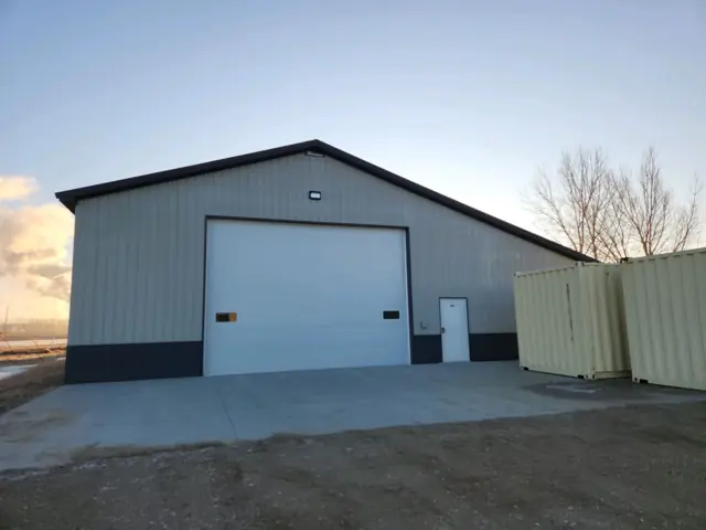 A shop building with a paved apron, a commercial building inspected by Nordic Inspections in Hankinson, ND.