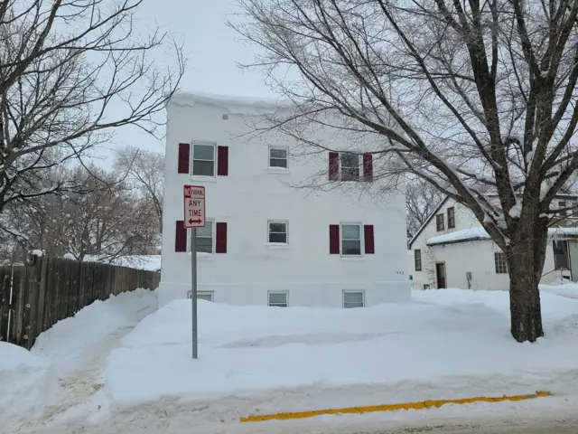 A walk-up apartment building with a shared entrance, a commercial building inspected by Nordic Inspections in Jamestown, ND.