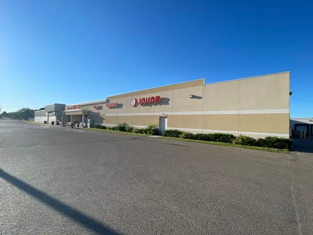 A retail center with a large parking lot, a commercial building inspected by Nordic Inspections in Jamestown, ND.