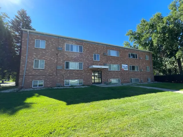A walk-up apartment building with a shared entrance — commercial building inspected by Nordic Inspections in Mayville, ND.