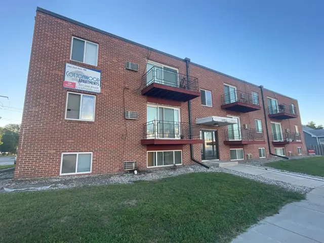 A walk-up apartment building with a shared entrance — commercial building inspected by Nordic Inspections in Mayville, ND.