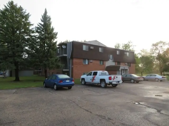 A walk-up apartment building with a shared entrance — commercial building inspected by Nordic Inspections in Moorhead, MN.