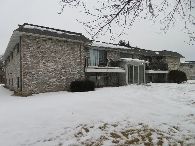 A multi-story brick apartment building, a commercial building inspected by Nordic Inspections in Moorhead, MN.
