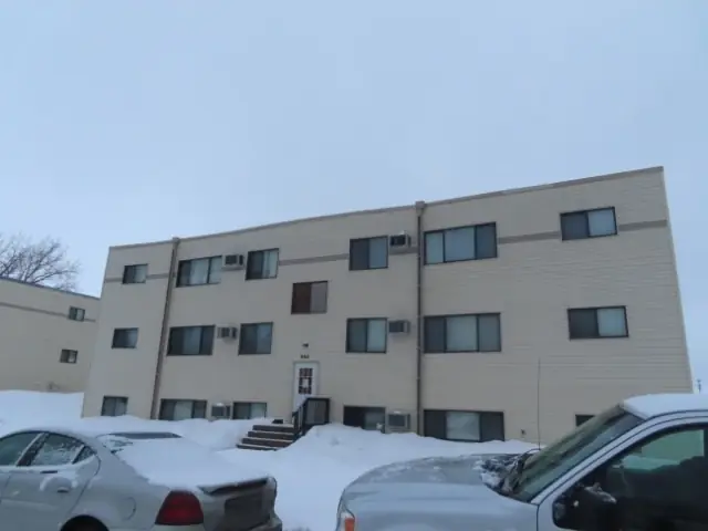 A walk-up apartment building with a shared entrance, a commercial building inspected by Nordic Inspections in Moorhead, MN.
