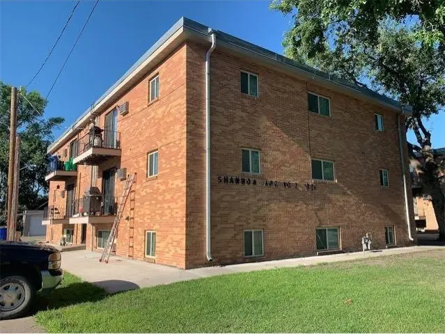 A multi-story brick apartment building, a commercial building inspected by Nordic Inspections in Moorhead, MN.