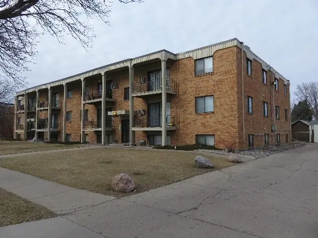 A multi-story brick apartment building, a commercial building inspected by Nordic Inspections in Moorhead, MN.