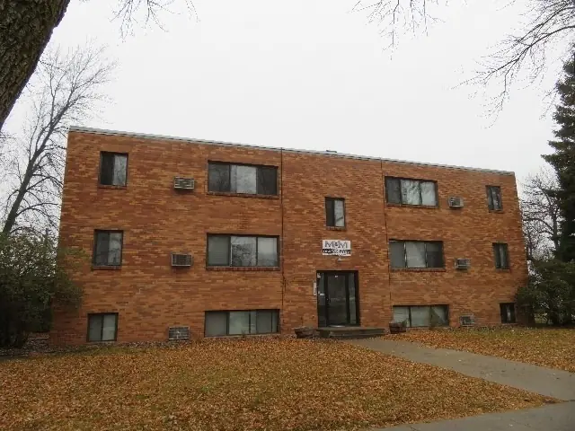 A three-story apartment building — commercial building inspected by Nordic Inspections in Moorhead, MN.