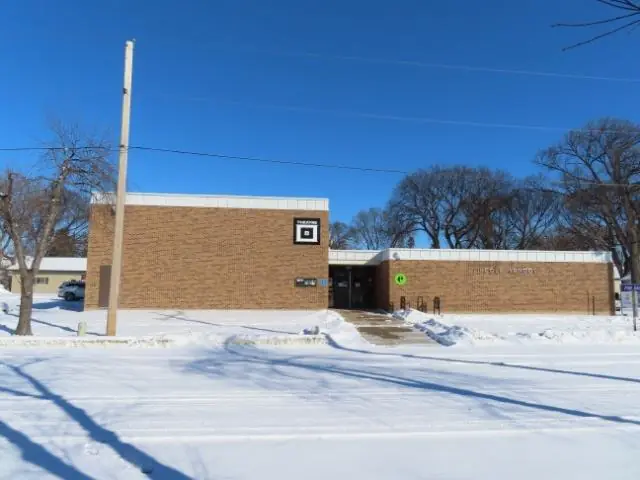 A single-story office building with a front parking lot — commercial building inspected by Nordic Inspections in Moorhead, MN.