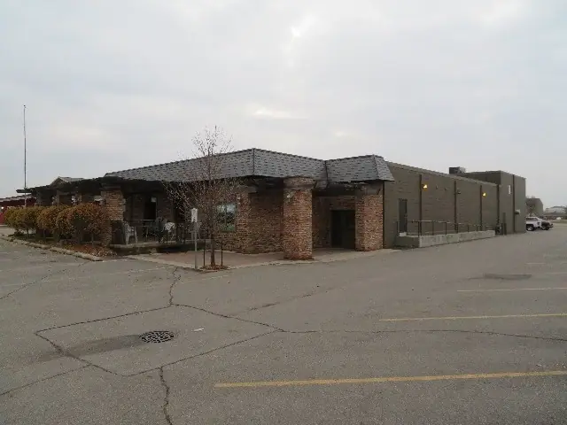 A single-story office building with a front parking lot — commercial building inspected by Nordic Inspections in Moorhead, MN.