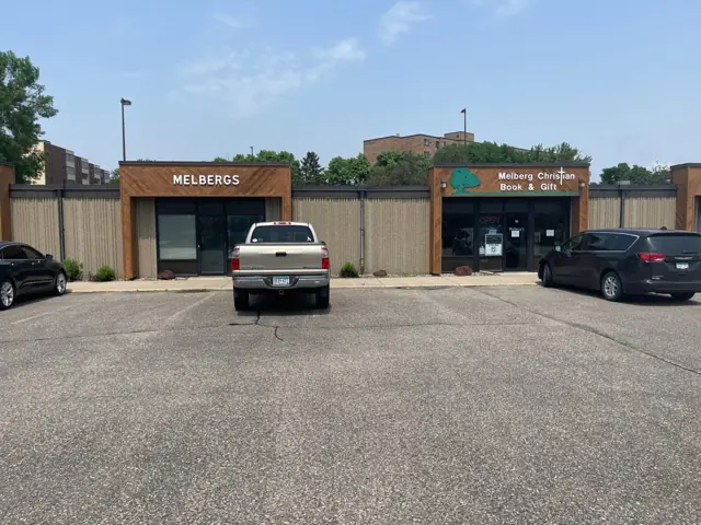 A strip retail center with several storefronts — commercial building inspected by Nordic Inspections in Moorhead, MN.