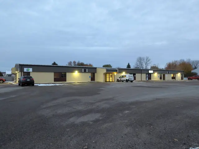 A retail center with a large parking lot, a commercial building inspected by Nordic Inspections in Moorhead, MN.