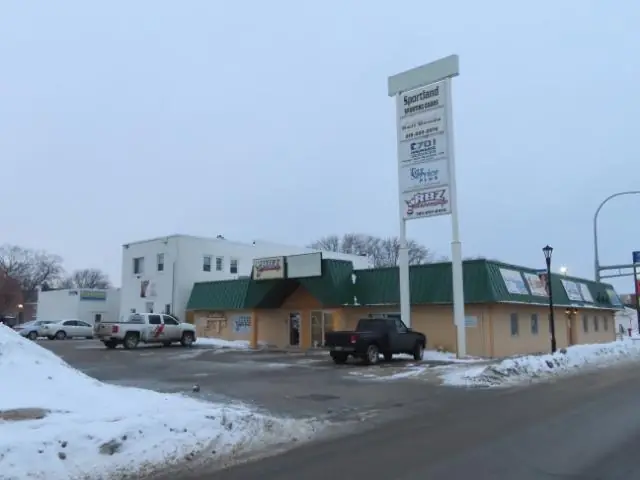 A strip retail center with several storefronts, a commercial building inspected by Nordic Inspections in Moorhead, MN.